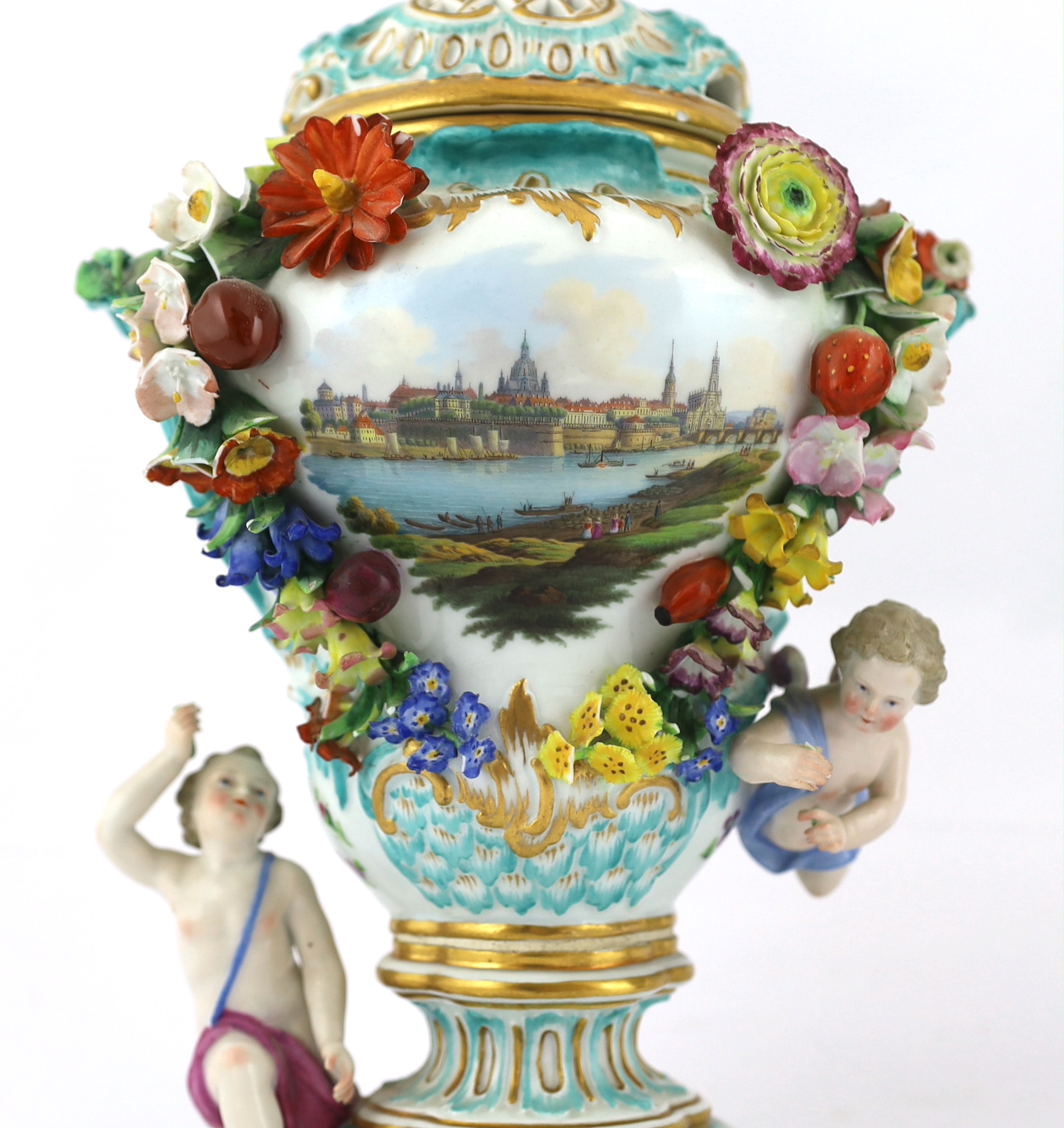A pair of Meissen topographical flower encrusted vases and covers, 19th century, losses
